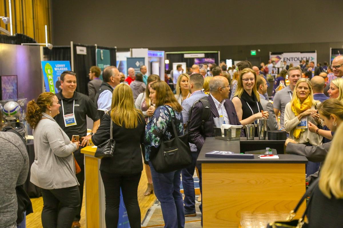 People meeting in an exhibit hall