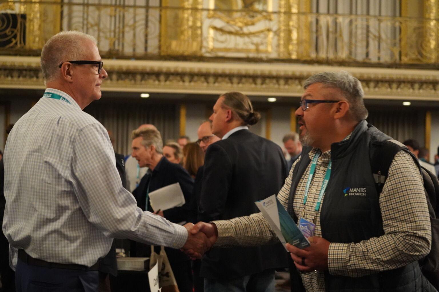 People meeting in an exhibit hall