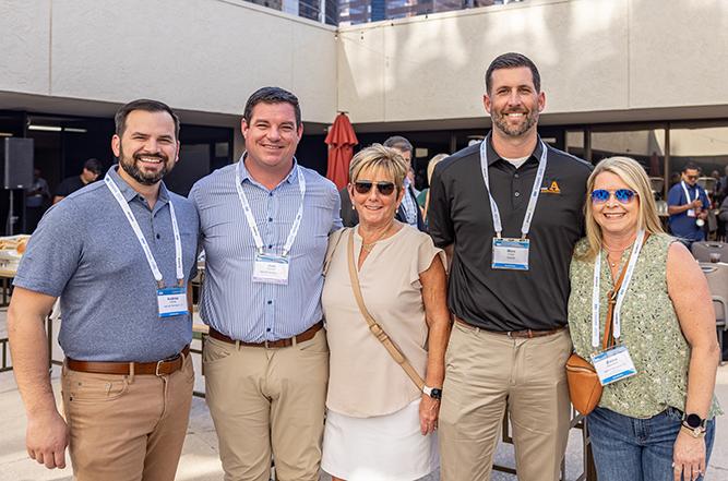 professionals posing at an event